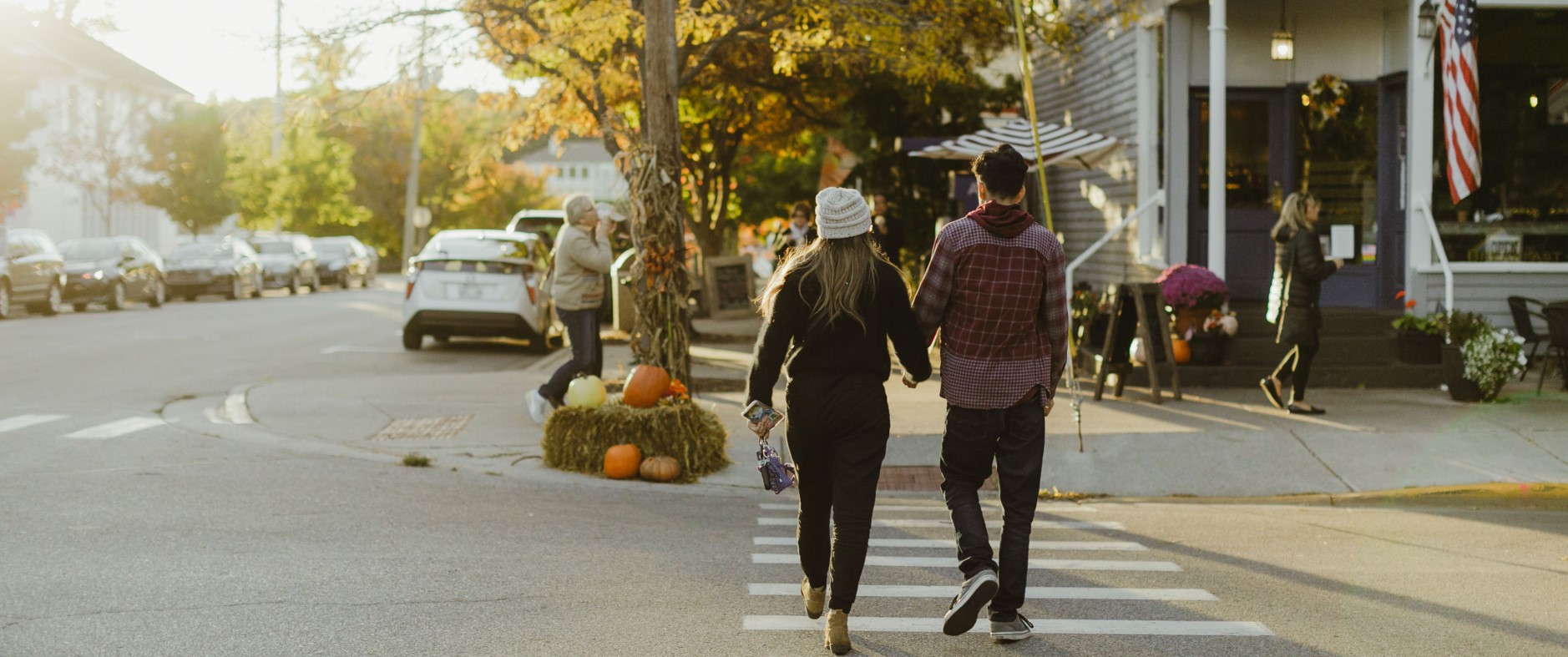 saugatuck in the fall couple walking down street